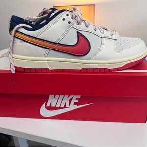 Nike Dunk Low Retro SE in Pale Ivory and Crimson